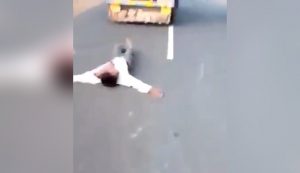 man pulled tied with truck, dies