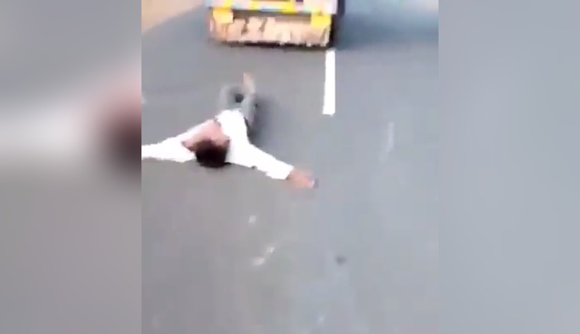 man pulled tied with truck, dies