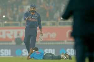 Rohit Sharma's fan lies down before him