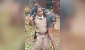Woman cop carries man on shoulders in Chennai