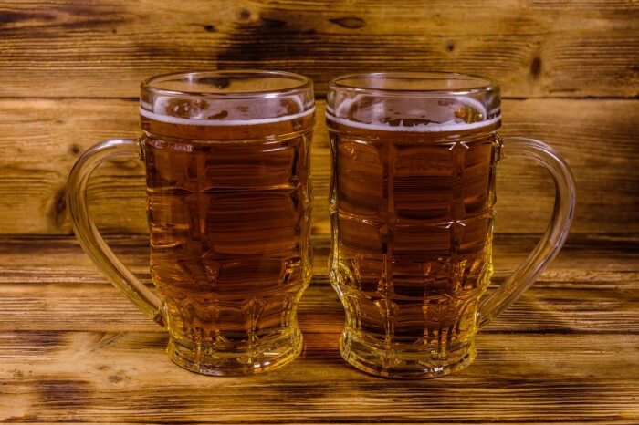 Beer two-glasses-beer-rustic-wooden-table (1) (1)