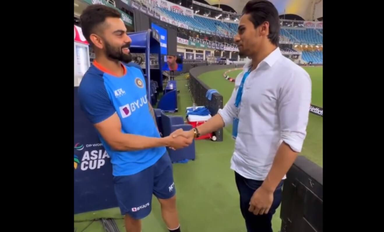 Virat Kohli and Momin Saqib (1)