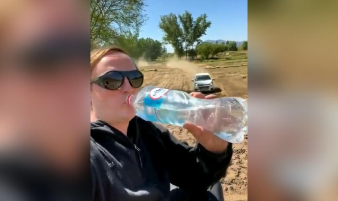 woman was drinking water and car crossed over her 1 (1) (1)