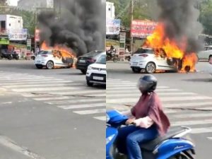 Car catches fire in Noida (1) (1)