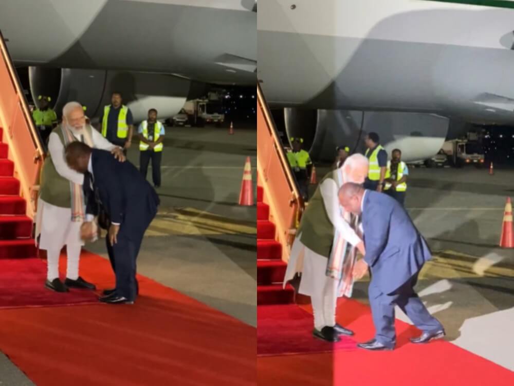 Papau PM touches PM Modis feet (1) (1)