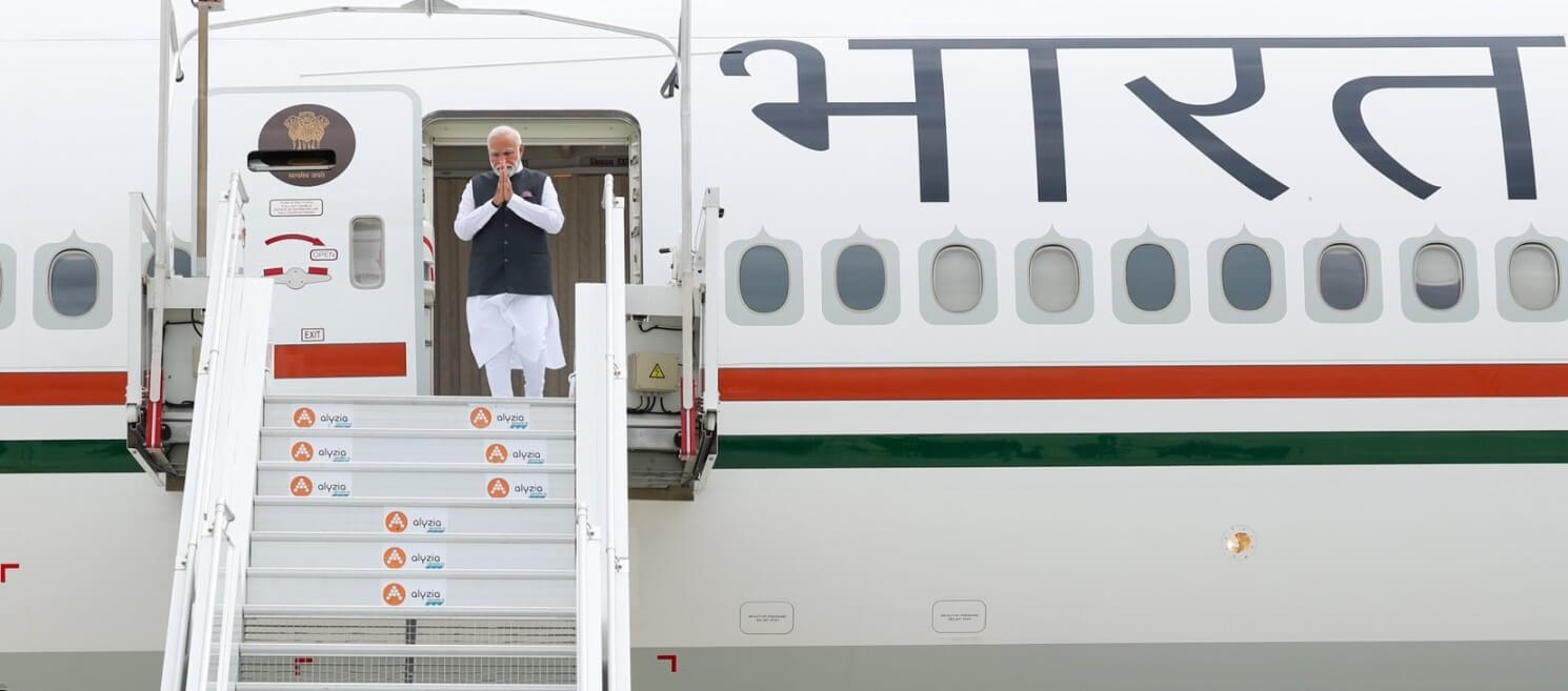 PM Modi In Plane For Foreign Visit (1)