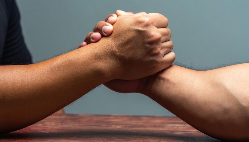 Arm Wrestling Depositphotos_769562848_XL (1)