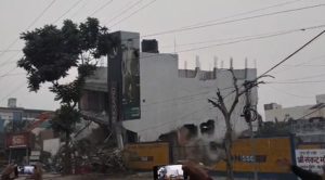 bulldozer action against showroom in Bareilly (1) (1)