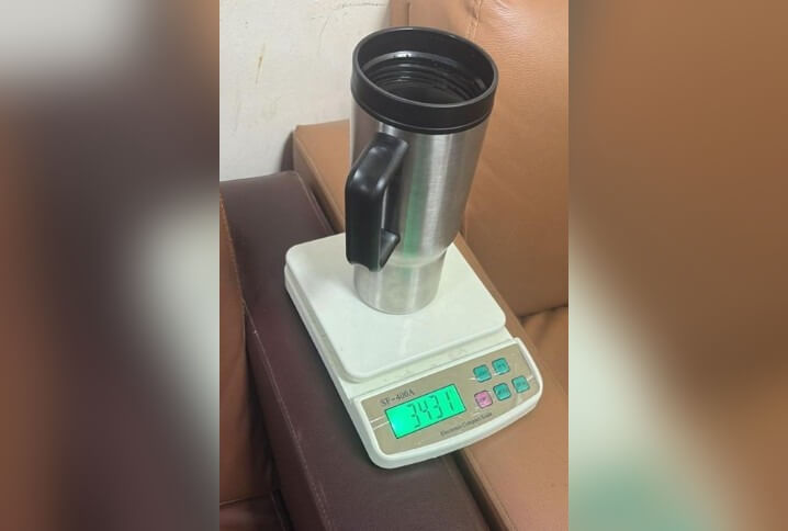 gold hidden in water tumbler 2 IANS Dec 31 (1)