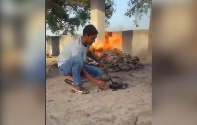 youth lit hookah from pyre