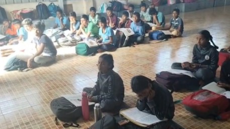 STUDENTS IN Cow Shelter